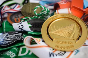 Medailles van alle uitgelopen hardloopwedstrijden